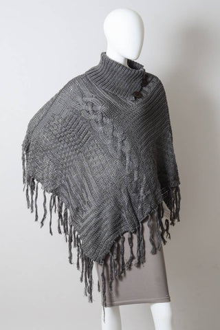 Turtleneck Cable Knit Poncho With Tassels