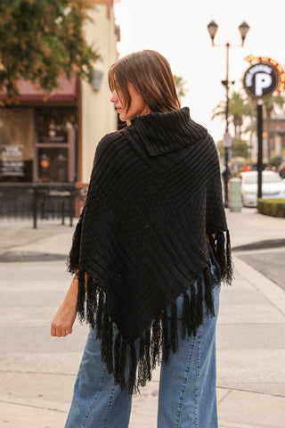 Turtleneck Cable Knit Poncho With Tassels