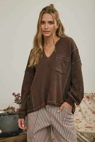 SPLIT NECK RAW EDGE LONG SLEEVE RIBBED KNIT TOP