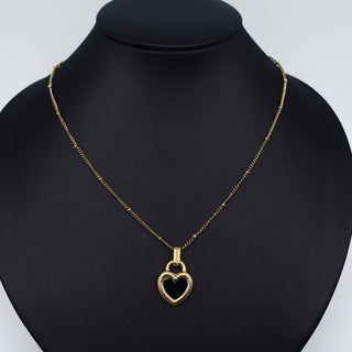 Gold plated stainless steel necklace with a two-sided enamel heart pendant, black on one side, pink on the other, view 2