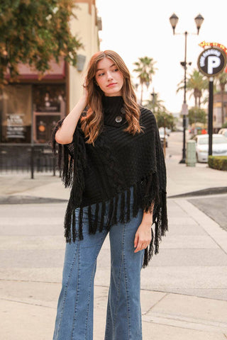 Turtleneck Cable Knit Poncho With Tassels