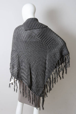 Turtleneck Cable Knit Poncho With Tassels