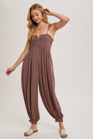 GAUZE SMOCKED BUTTON FRONT SHOULDER TIE JUMPSUIT