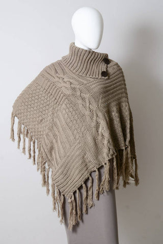 Turtleneck Cable Knit Poncho With Tassels