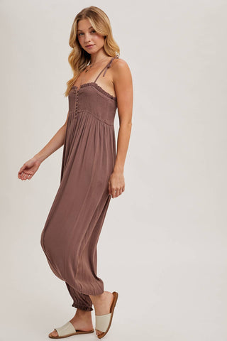 GAUZE SMOCKED BUTTON FRONT SHOULDER TIE JUMPSUIT