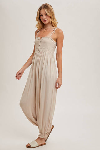 GAUZE SMOCKED BUTTON FRONT SHOULDER TIE JUMPSUIT