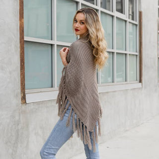 Turtleneck Cable Knit Poncho With Tassels