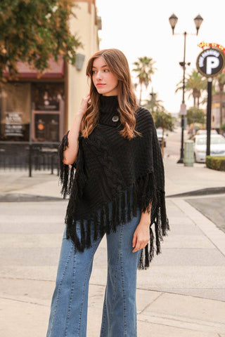 Turtleneck Cable Knit Poncho With Tassels
