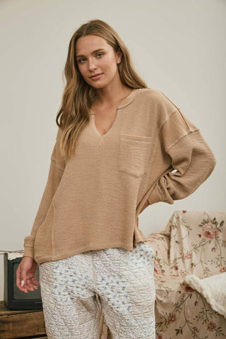 SPLIT NECK RAW EDGE LONG SLEEVE RIBBED KNIT TOP