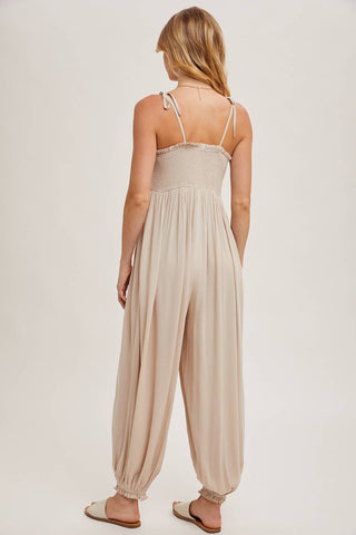 GAUZE SMOCKED BUTTON FRONT SHOULDER TIE JUMPSUIT