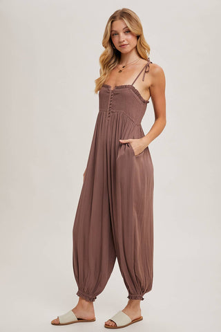 GAUZE SMOCKED BUTTON FRONT SHOULDER TIE JUMPSUIT - Rise and Redemption