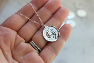 Silver Zodiac Necklace Coin Disk - Rise and Redemption