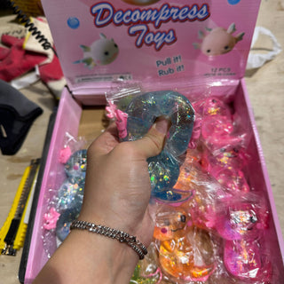 Sugar Squeeze Glitter Axolotl Toy - Rise and Redemption