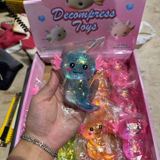 Sugar Squeeze Glitter Axolotl Toy - Rise and Redemption
