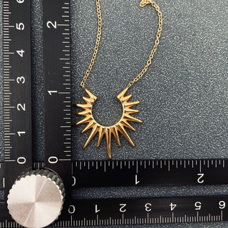 Sunburst Charm 18K Gold Plated Stainless Steel Necklace - Rise and Redemption